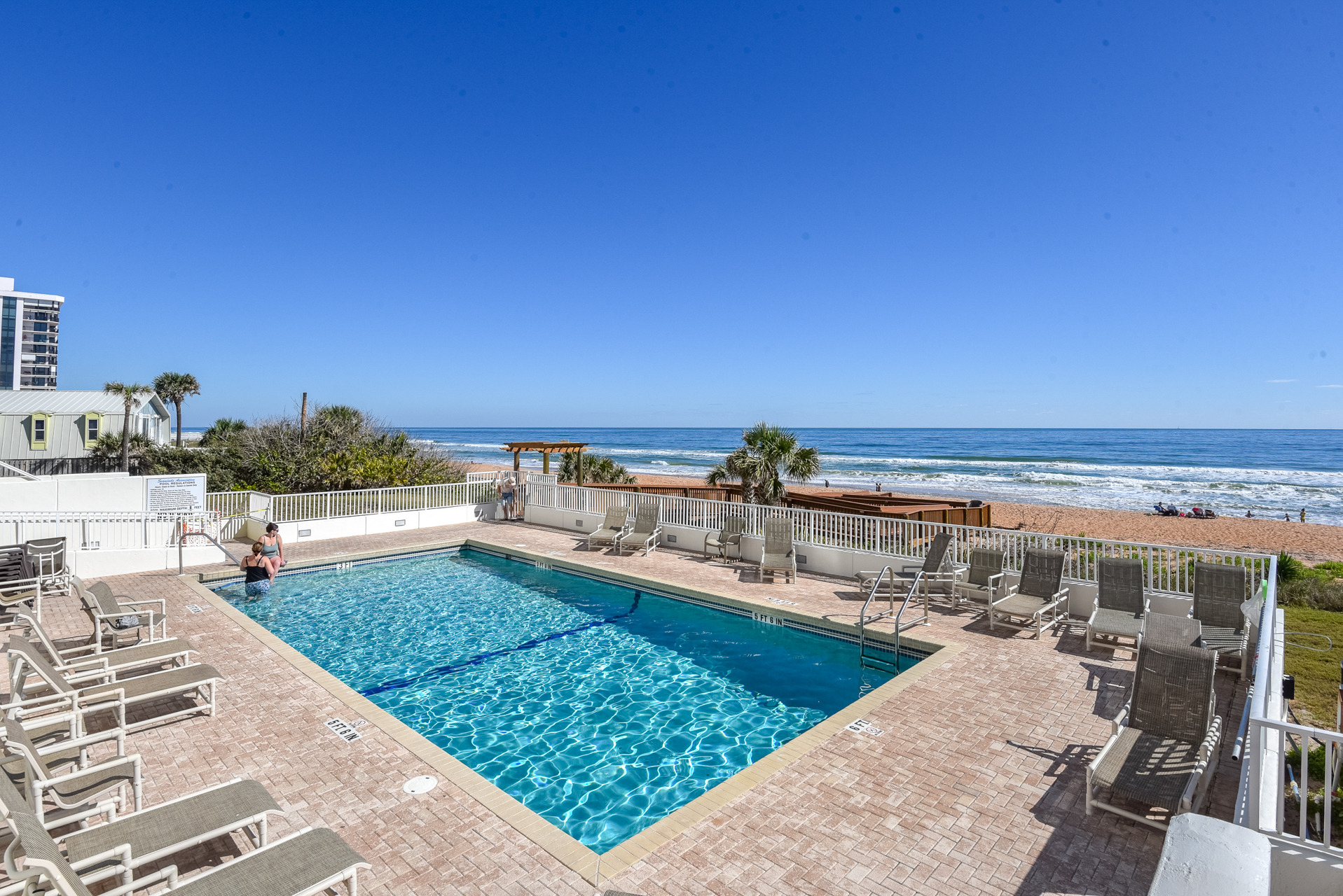 Oceanfront heated pool with furniture
